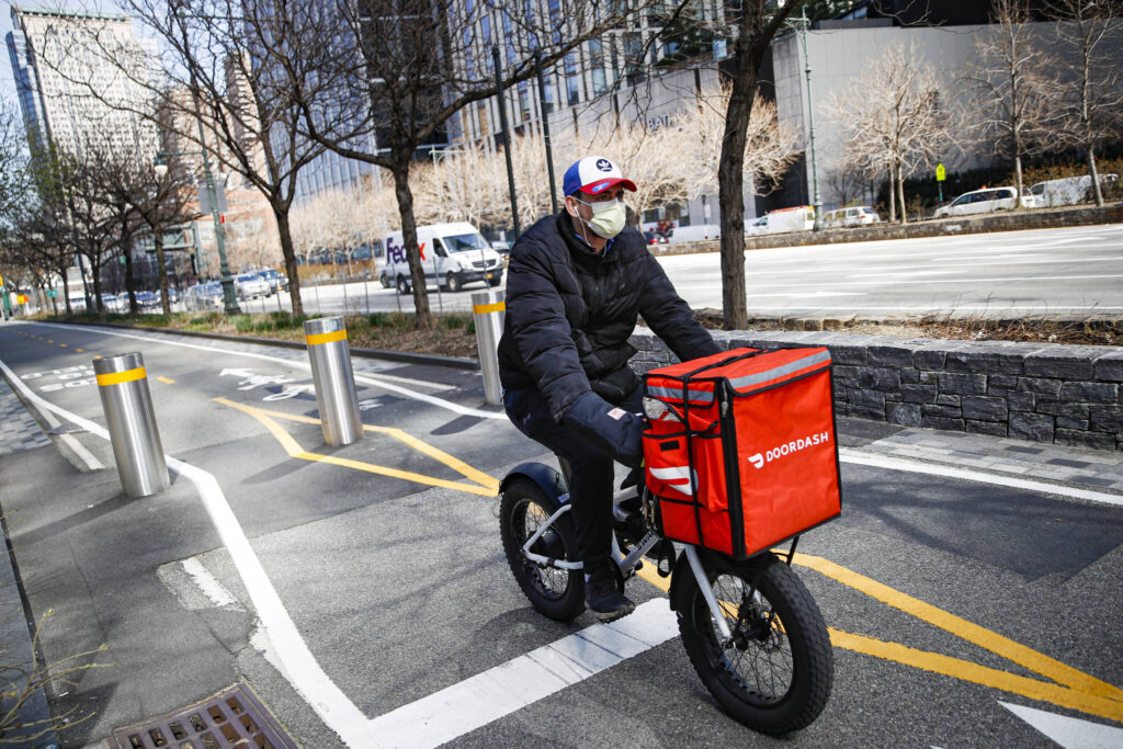 Pay, unpredictability top concerns for B.C. ride-hail and food delivery workers: report