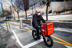 Pay, unpredictability top concerns for B.C. ride-hail and food delivery workers: report